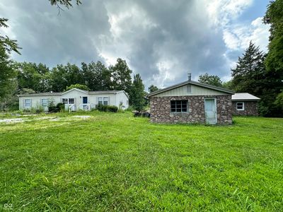 The detached garage would make a great workshop or could be converted into a rental property. | Image 1