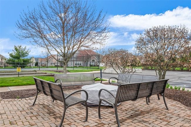 Get some exercise. Take a walk from home and stop to take a rest on these benches in the community courtyard and enjoy the gas firepit on a comfortable fall evening! | Image 40
