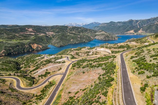 Aerial overview of property's location featuring a water and mountain view | Image 15