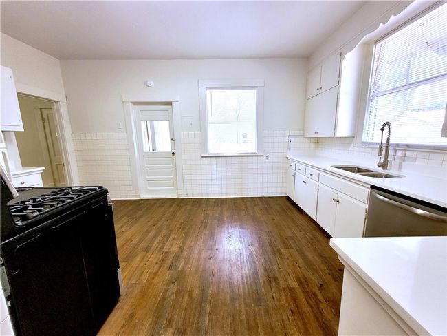 Extra deep gourmet double sink and lots of natural light! | Image 8