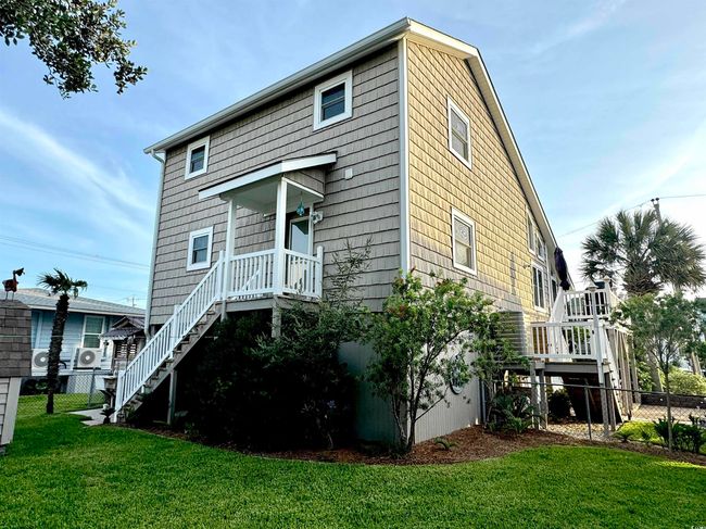 Back of house featuring stairs | Image 6
