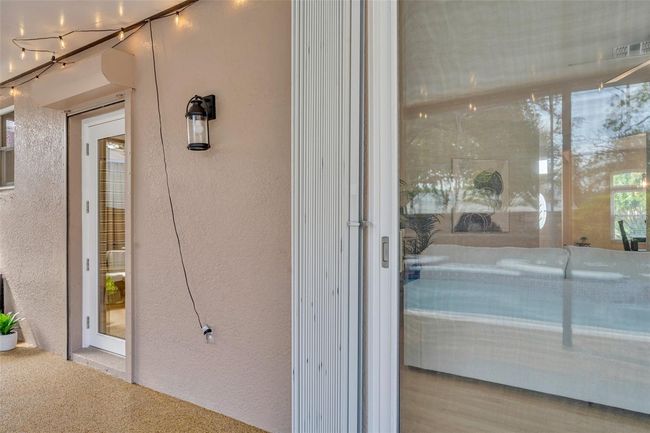 Accordian Hurricane Shutters on Slider & Shutter on Pool Bath Door | Image 50