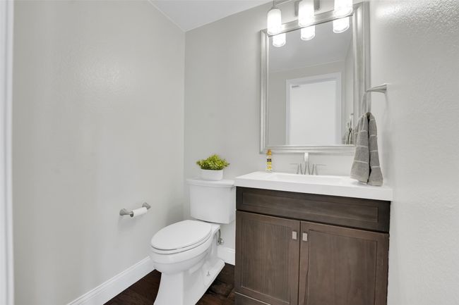 Bathroom featuring vanity and wood finished floors | Image 16