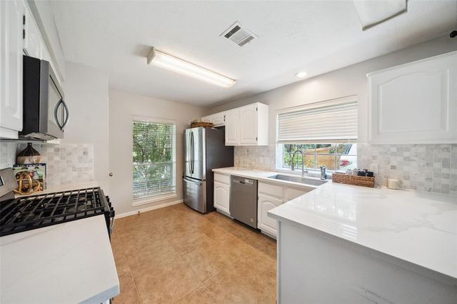 20407 Weald Way St, House other with 4 bedrooms, 3 bathrooms and 2 parking in Spring TX | Image 9