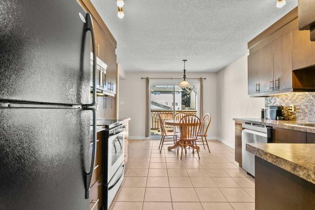 19 Erin Park Bay Se, Home with 4 bedrooms, 2 bathrooms and 2 parking in Calgary AB | Image 13