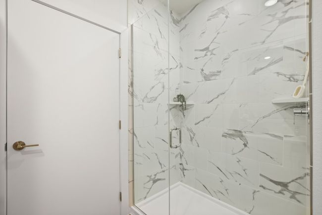Full bathroom with large walk-in shower. *Photos are of similar unit* | Image 12