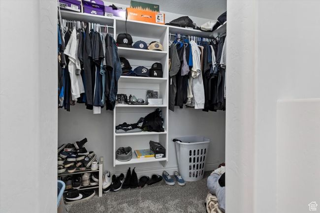 Walk in closet with carpet | Image 21