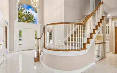 2-story entry with chandelier and tile floor | Image 2