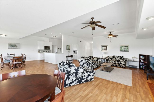 Bright and open living, dining, kitchen area | Image 7