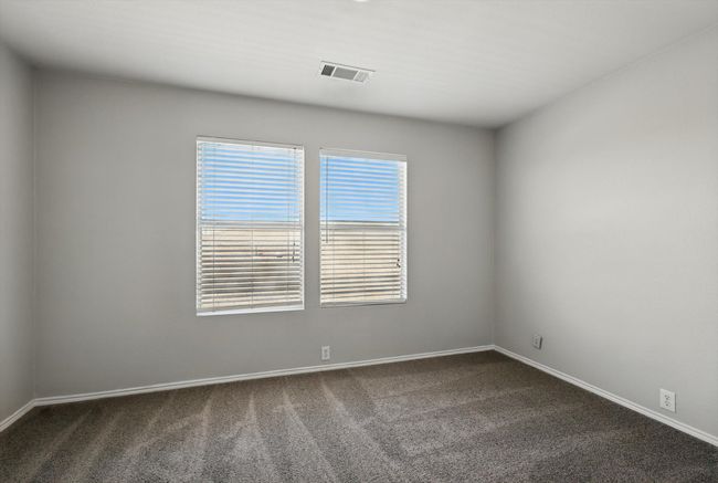 Empty room with dark carpet and baseboards | Image 21