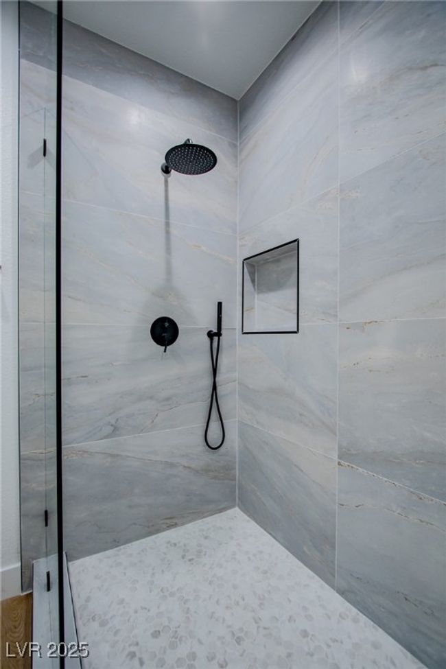 Full bathroom featuring a tile shower | Image 17