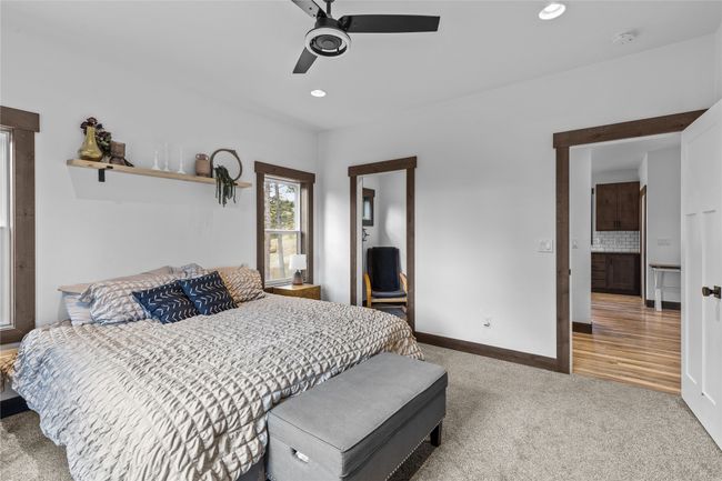 Carpeted bedroom with recessed lighting, ceiling fan, and baseboards | Image 23
