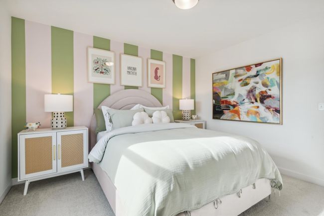 (Photo of model home, actual features may vary) Each of the home's three secondary bedrooms on the upper level come perfectly sized and all feature a spacious closet. | Image 12