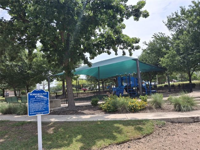 View of community playground with fence | Image 20
