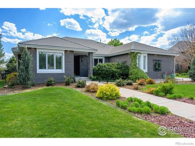 Large 5054 sq ft brick ranch with tile roof. Contemporary update thru out | Image 1