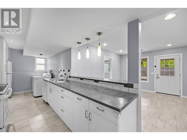 1503 Tanemura Cres, House other with 6 bedrooms, 4 bathrooms and 4 parking in Kelowna BC | Image 27