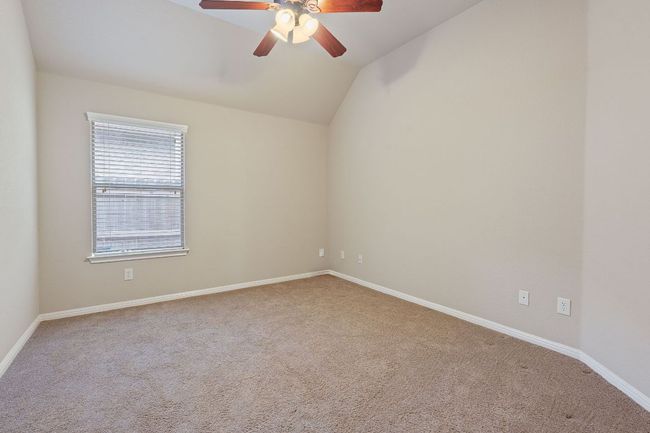Bedroom 2 room featuring ceiling fan | Image 16