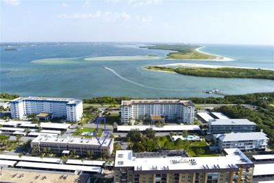 8 Glencoe PL #308, Dunedin FL. 2-Bed, 1 Bath top floor Condo. Located in the Royal Stewart Arms 55+ Community featuring heated pool, Tennis courts, Shuffleboard, Pickleball, community center, sauna, fishing pier, and so much more! Located on the beautiful Dunedin Causeway just before Honeymoon State Park & Beaches. | Image 3