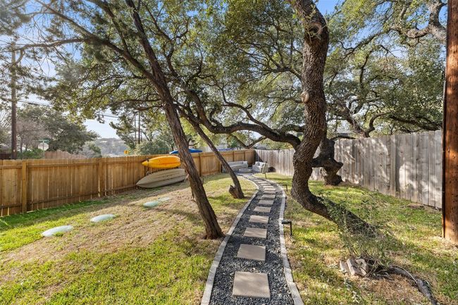 View of yard with a fenced backyard | Image 31