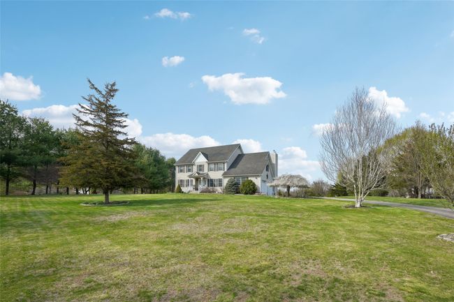 View of front of house featuring a front lawn | Image 43