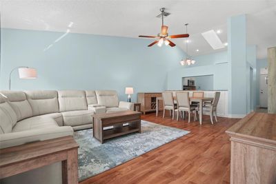 Open floor plan highlighted by vaulted ceilings. | Image 3