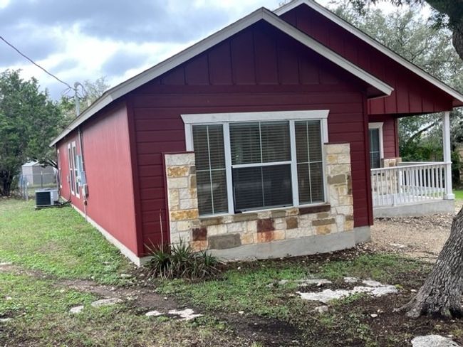 View of property exterior featuring great front-side-back yard! | Image 11