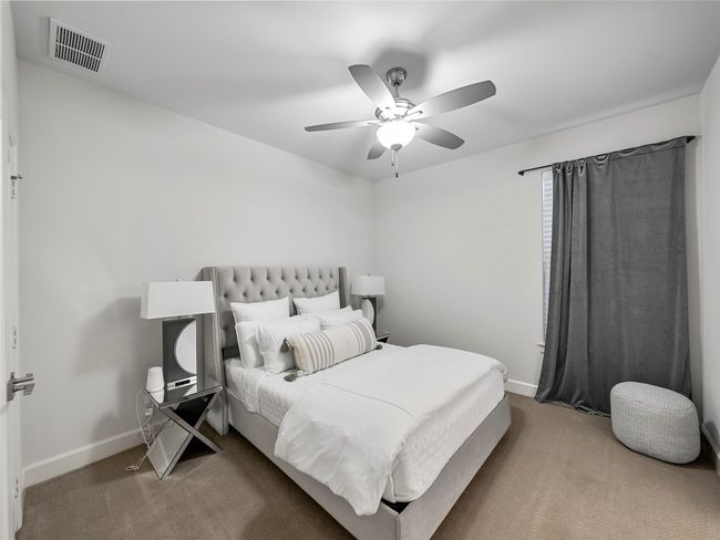 1st floor Bedroom with carpet flooring and a ceiling fan | Image 31