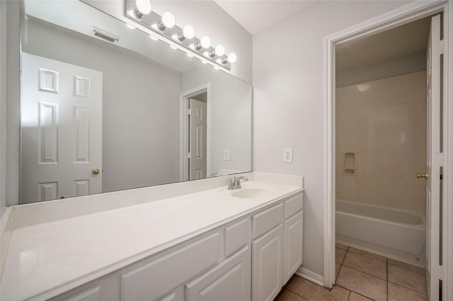 Secondary bathroom with lots of storage space | Image 17