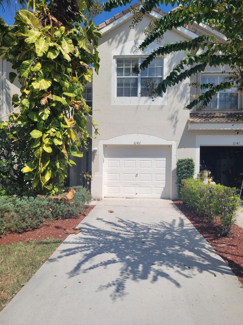 1042 Woodfield Rd, Greenacres, FL, 33415-1408 | Card Image