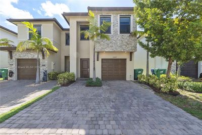 24947 Sw 108th Ave, Townhouse with 4 bedrooms, 3 bathrooms and null parking in Homestead FL | Image 1