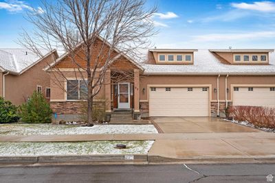 View of front facade with a garage | Image 1