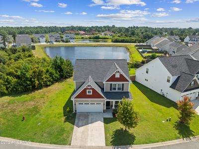 Corner lot on peaceful fishing pond | Image 1