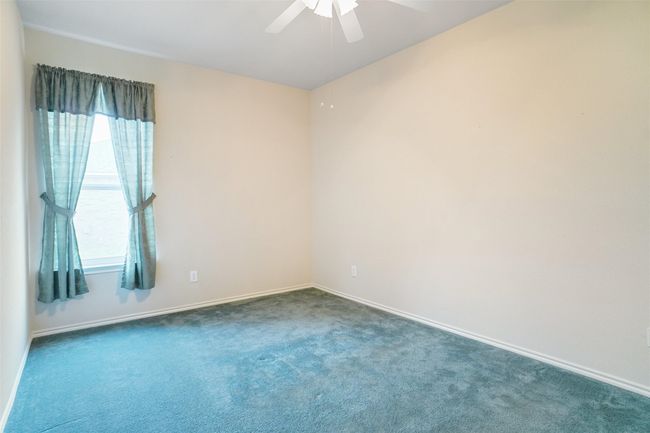 Carpeted Bedroom featuring ceiling fan | Image 22