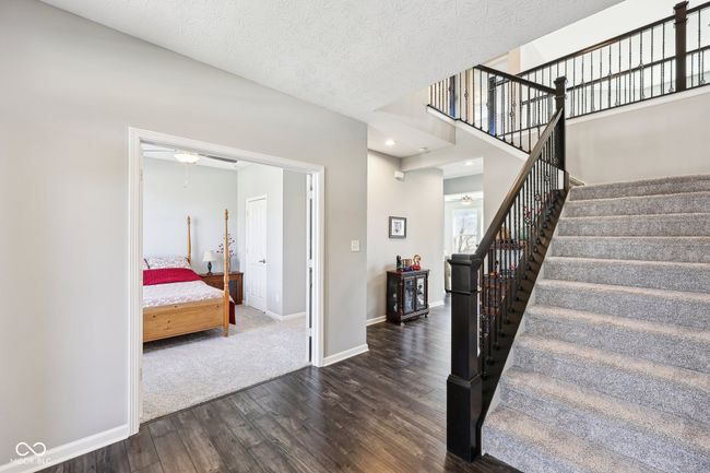 Entry with view towards the main level ensuite bedroom. | Image 21