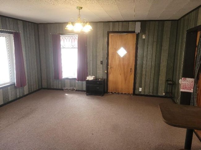 View of Dining Room From Kitchen! Front Door in Background. | Image 6