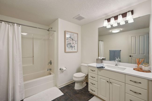 Lower level full bathroom is conveniently located for easy access to the pool and outdoor entertaining space. | Image 68
