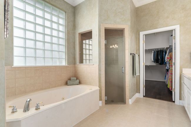Jetted tub, separate shower, and well-designed walk-in closet! | Image 18