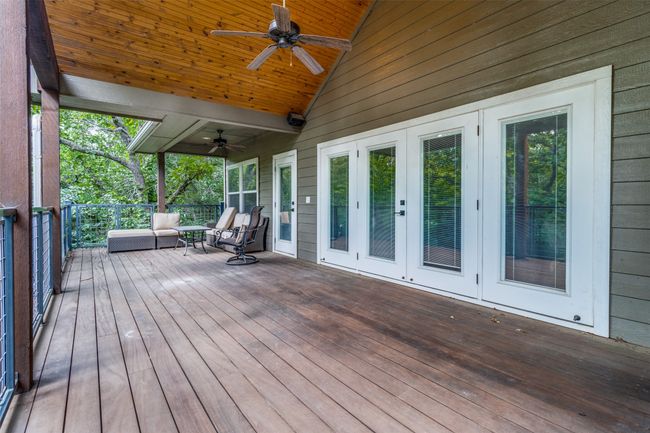 Wooden terrace with ceiling fan and french doors | Image 29