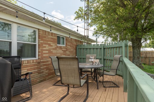 wooden terrace with outdoor dining space | Image 20