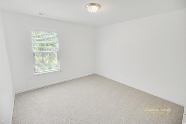 Empty room featuring carpet flooring and baseboards | Image 28