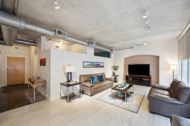 Living room (approx. 22x13) and adjacent dining area (approx. 12x10). | Image 4