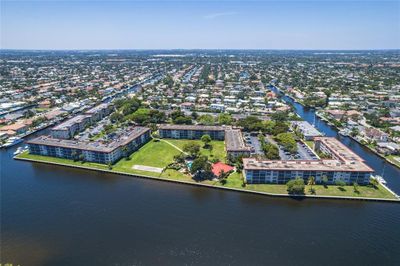 Experience waterfront living in this Two bedroom / 2 bath condo located in desirable Lighthouse Point | Image 1