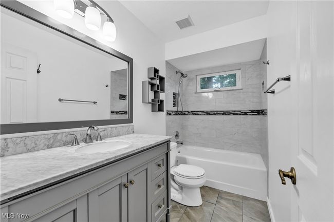 SECOND FLOOR FULL BATHROOM RECENTLY UPDATED WITH MODERN TILES AND FIXTURES | Image 28