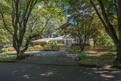 Quiet Ranch, Set Back on Corner Lot with Circular Driveway | Image 1