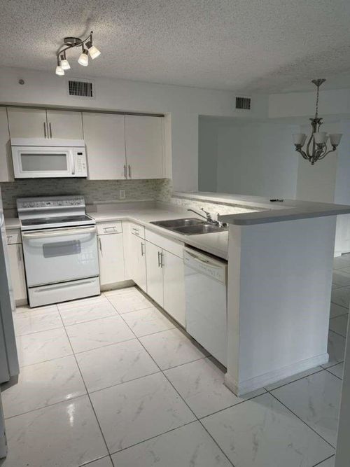 apt-103-4856 N State Road 7, Coconut Creek, FL, 33073-3340 | Card Image