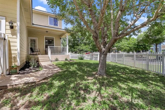 Fenced backyard featuring covered porch | Image 32