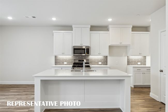 The spacious island is the hub of your new kitchen and the perfect place for friends and family to gather round! REPRESENTATIVE PHOTO | Image 6