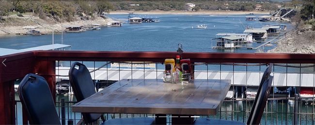 Enjoy the Lighthouse neighborhood restaurant! Get breakfast, lunch or dinner on the back deck or inside - all with views of Lake Travis! | Image 28