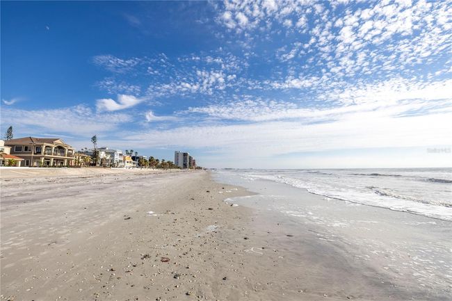 Enjoy a walk on the beach. | Image 10
