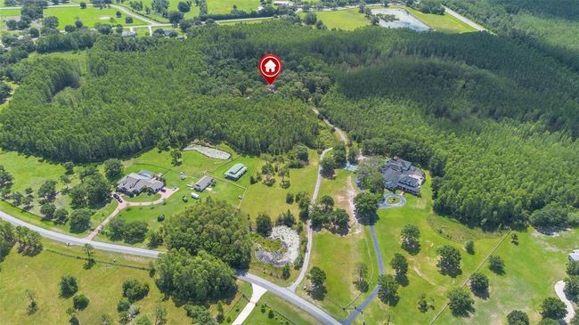 11933 Pasco Trails Blvd, House other with 4 bedrooms, 3 bathrooms and null parking in SPRING HILL FL | Image 51